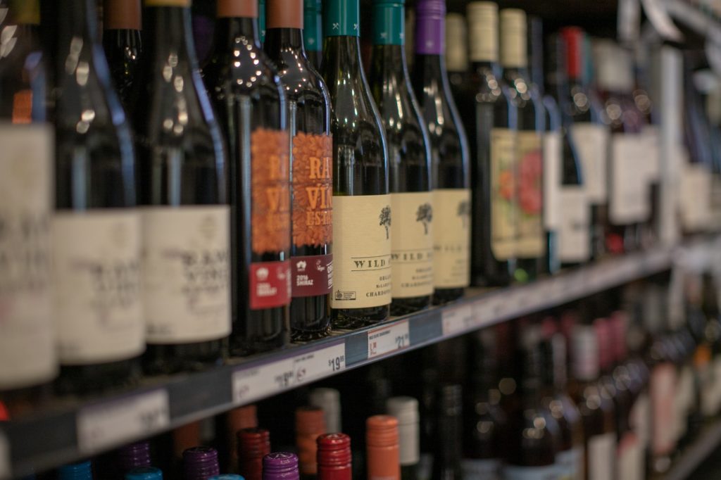 red wine on shelf