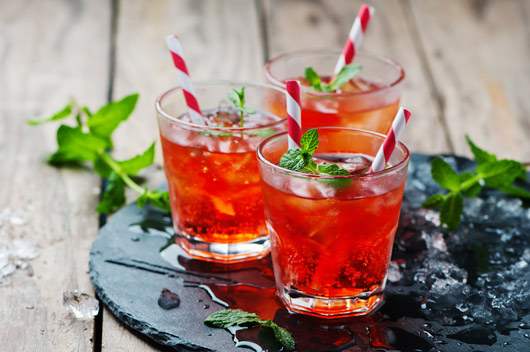Red Cocktail With Mint Leaves
