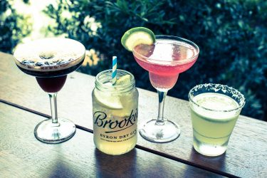 alcoholic drinks on wooden table